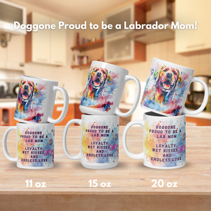 Doggone Proud to be a Labrador Retriever Mom Mug. Mug has a Lab surrounded by watercolor Clouds and Paws. Mug comes in 11oz, 15oz, and 20oz. Mugs stacked by size to show front and back on a stone counter.