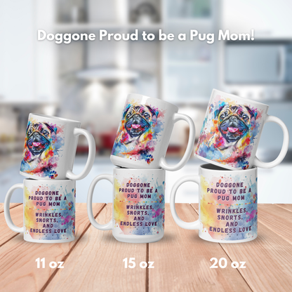 Doggone Proud to be a Pug Mom Mug. Mug has a Pug surrounded by watercolor Clouds and Paws. Mug comes in 11oz, 15oz, and 20oz. Mugs stacked by size to show front and back on a wood counter.