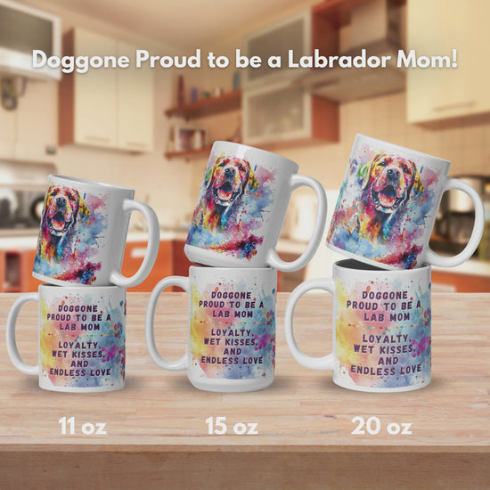 Doggone Proud to be a Lab Mom Mug Video. Video has three slides, the first shows the mugs in 3 different sized, 11oz, 15oz, 20oz. The mugs are stacked by size to show front and back on a kitchen counter. The second shows the artwork wraps all the way around the mug. There are three views of the mug, 1 shows the smiling Labrador Retriever, 2 shows the quote: Doggone Proud to be a Lab Mom, Loyalty, Wet Kisses, and Endless Love, and 3 shows that there is also Pug Mug, Corgi Mugs, and Frenchie Mugs available.