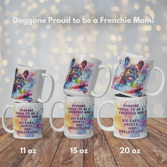 Doggone Proud to be a Frenchie Mom Mug Video. Video has three slides, the first shows the mugs in 3 different sized, 11oz, 15oz, 20oz. The mugs are stacked by size to show front and back on a kitchen counter. The second shows the artwork wraps all the way around the mug. There are three views of the mug, 1 shows the smiling French Bulldog, 2 shows the quote: Doggone Proud to be a Frenchie Mom, Big Ears, Snorts, and Endless Love, and 3 shows that there is also Lab Mug, Corgi Mugs, and Pug Mugs available.