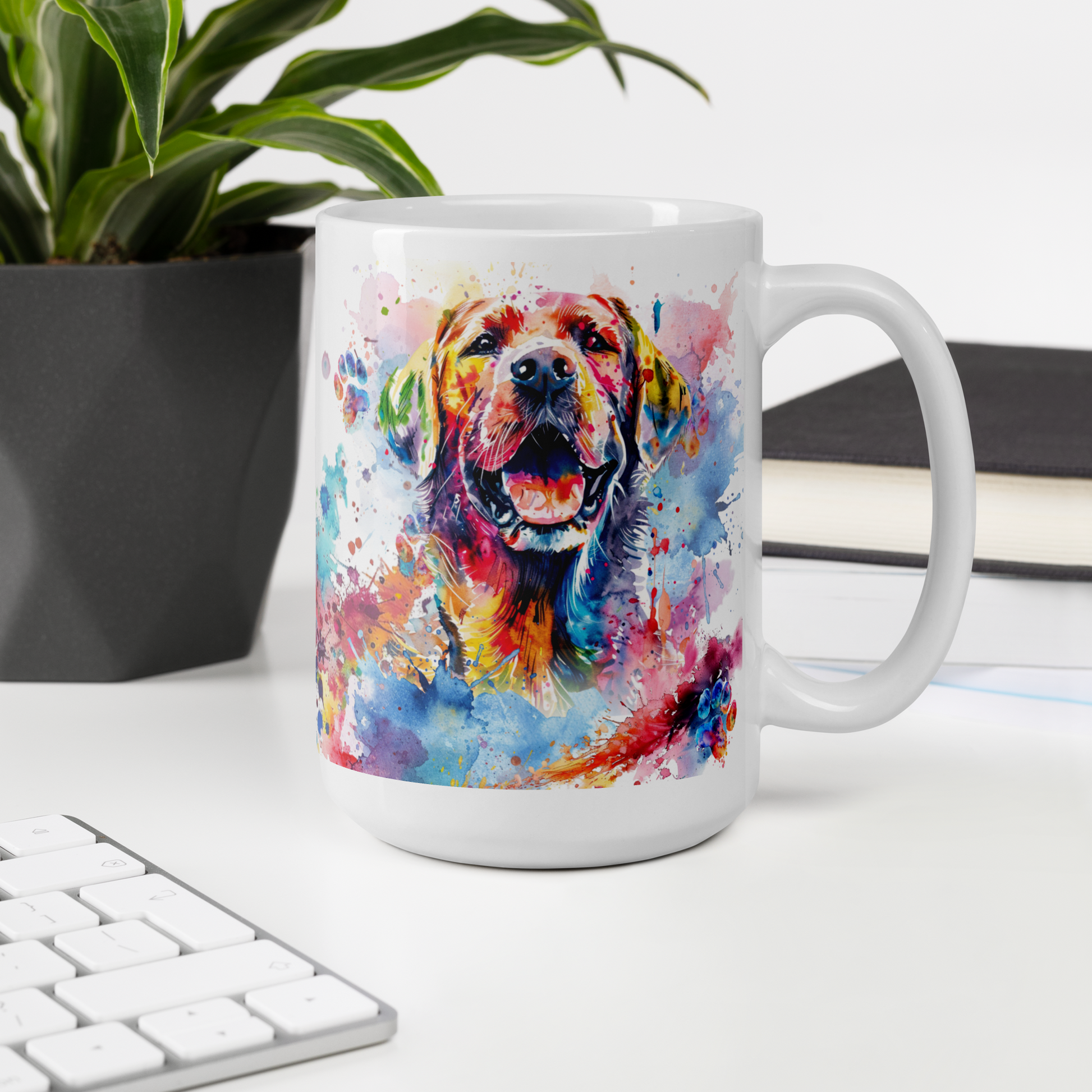 Doggone Proud Lab 15 oz Mug. A fun mug with a happy Labrador Retriever dog surrounded by colorful watercolor splashes, clouds, and paws. Mug is on a white desk with a plant book and keyboard. Great give for any dog lover or paw-rent.