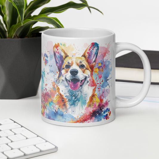 Doggone Proud Corgi 20 oz Large Big Mug. A fun mug with a happy Corgi dog surrounded by watercolor splashes, clouds, and paws. Mug is on a white desk with a plant book and keyboard. Great give for any dog lover or paw-rent.